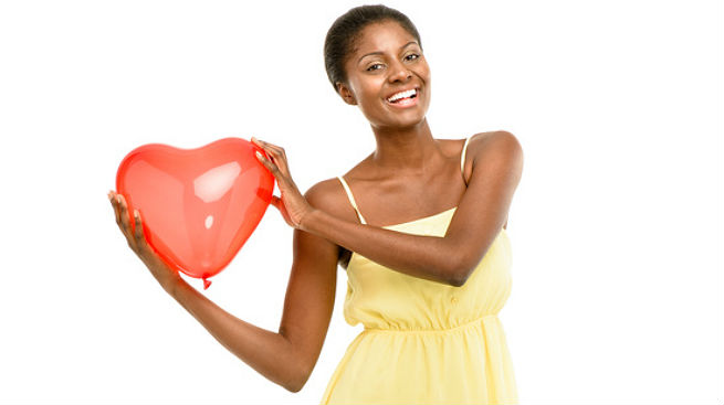  black girl holding love sign